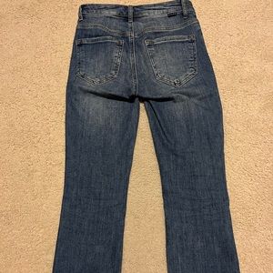 Risen slightly distressed frayed hem straight leg jeans